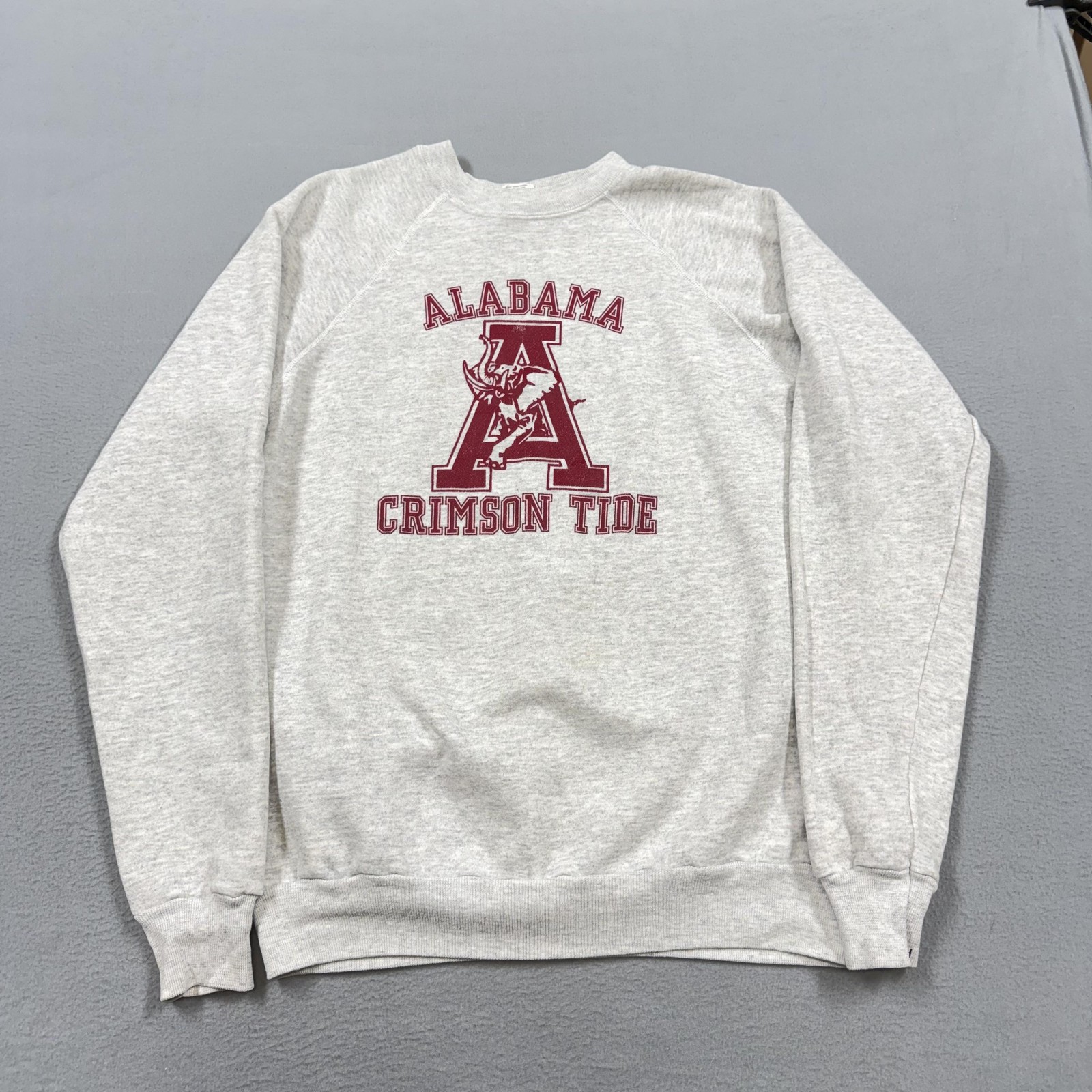 Ash crew: arched ALABAMA over a block A with the elephant on the crossbar, CRIMSON TIDE below
