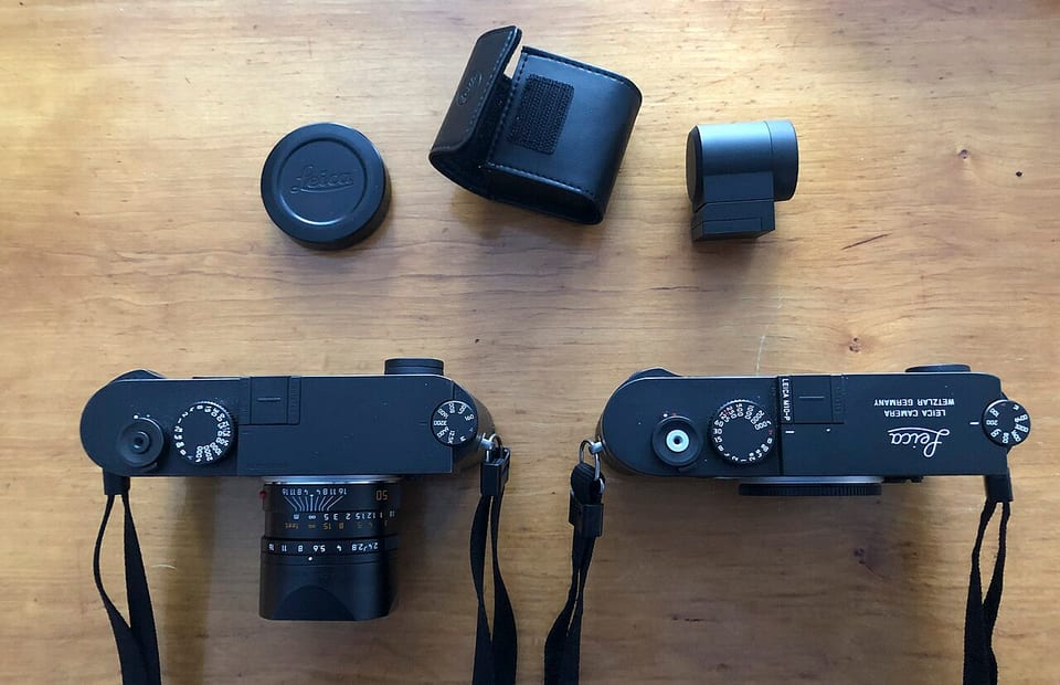 Top plates of an M10 Monochrom and M10-P side by side showing the ISO dials
