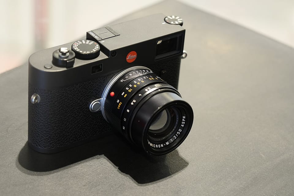 Leica M11 with a 50 mm Summicron on a display plinth
