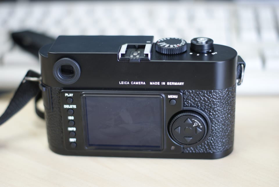 Rear of the Leica M9 showing the 2.5-inch screen and the five-button column