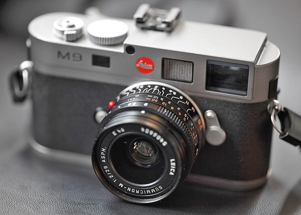 Leica M9 in black, front view with a lens fitted