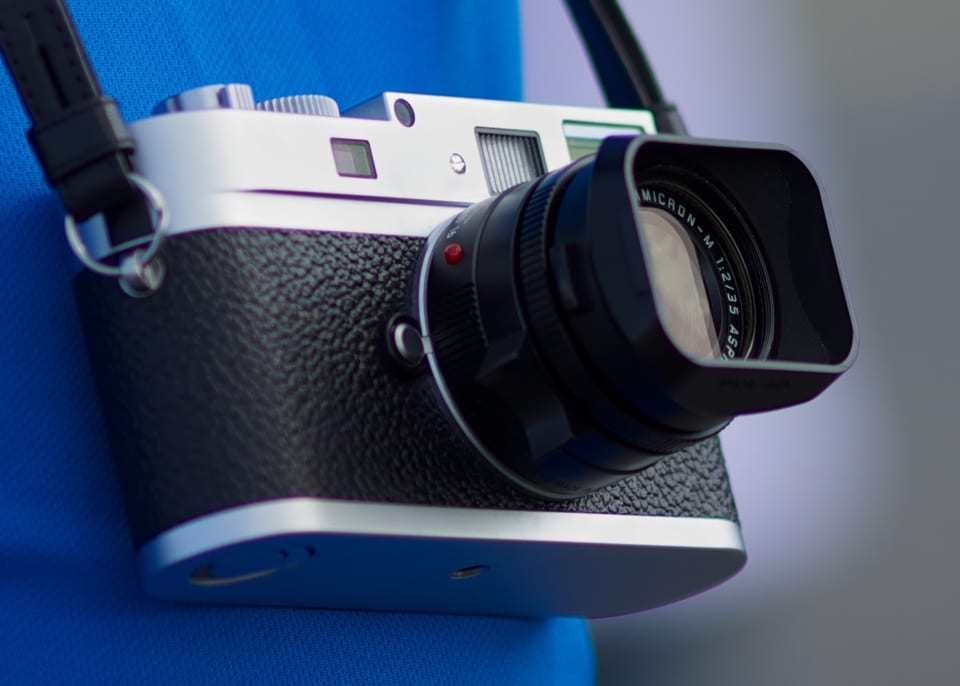 Silver Leica M9-P showing the engraved top plate and no red dot