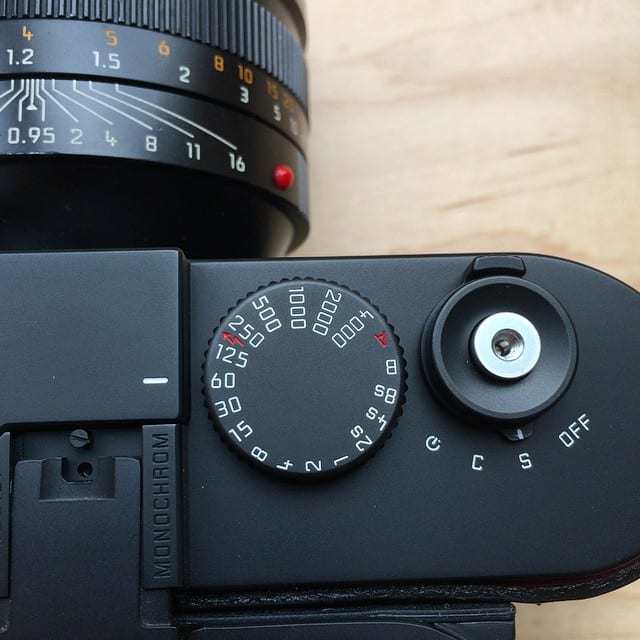 Close-up of the MONOCHROM engraving on the frame-line lever cover